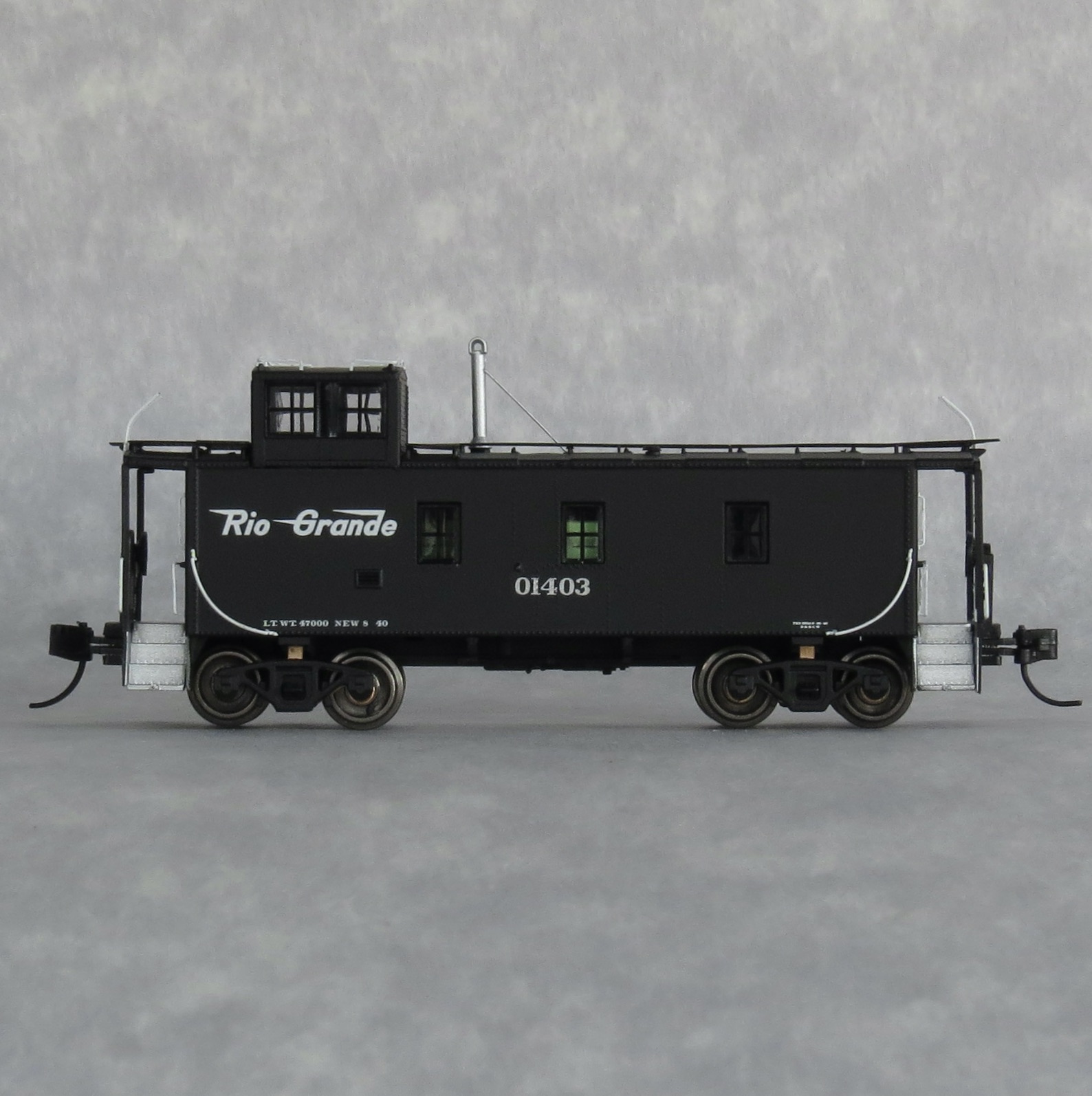 31401-03 Rio Grande black caboose - TRAINWORX